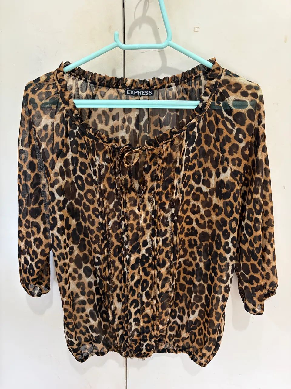 blusa express oncinha transparente m