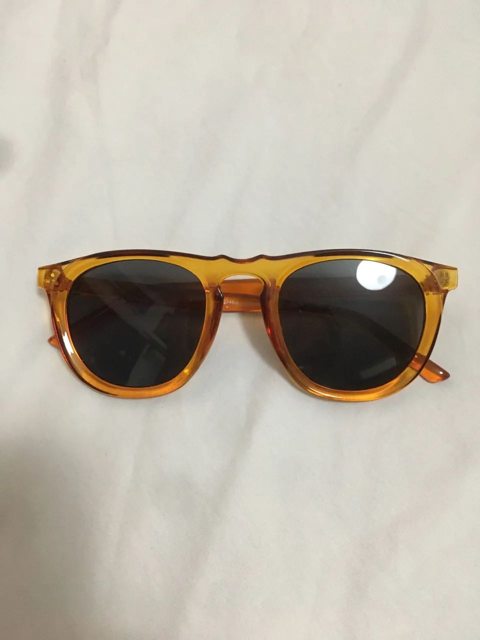 Óculos de sol armação laranja Renner