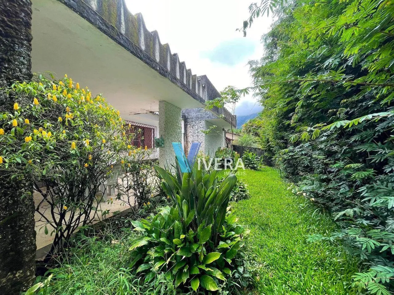 Casa com 4 dormitórios à venda, 200 m² por R$ 850.000,00 - Carlos Guinle - Teresópolis/RJ