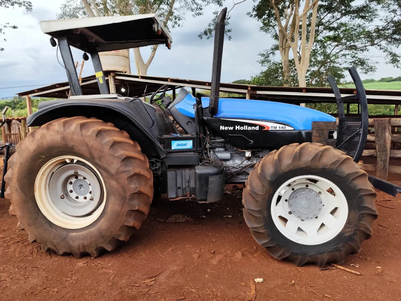 Trator TM 140 com grade recém reformada