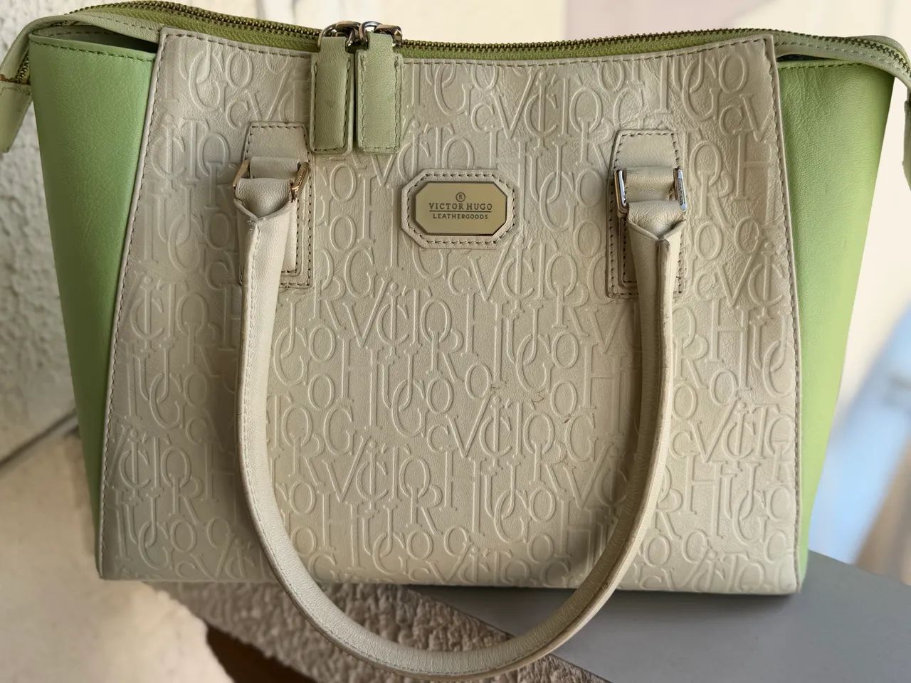Bolsa Hugo de mão 