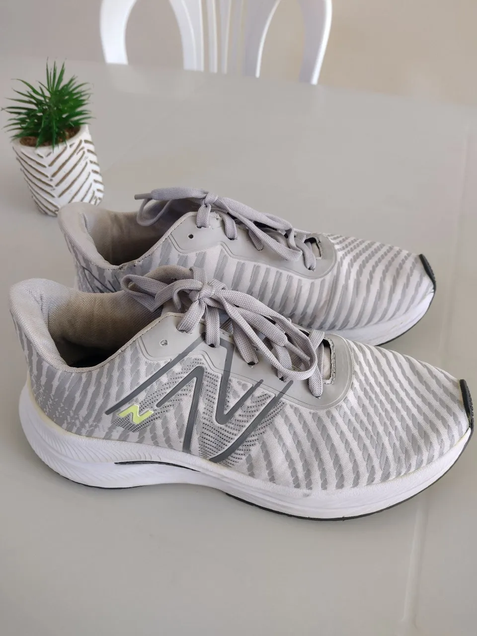 Tênis New Balance Cinza