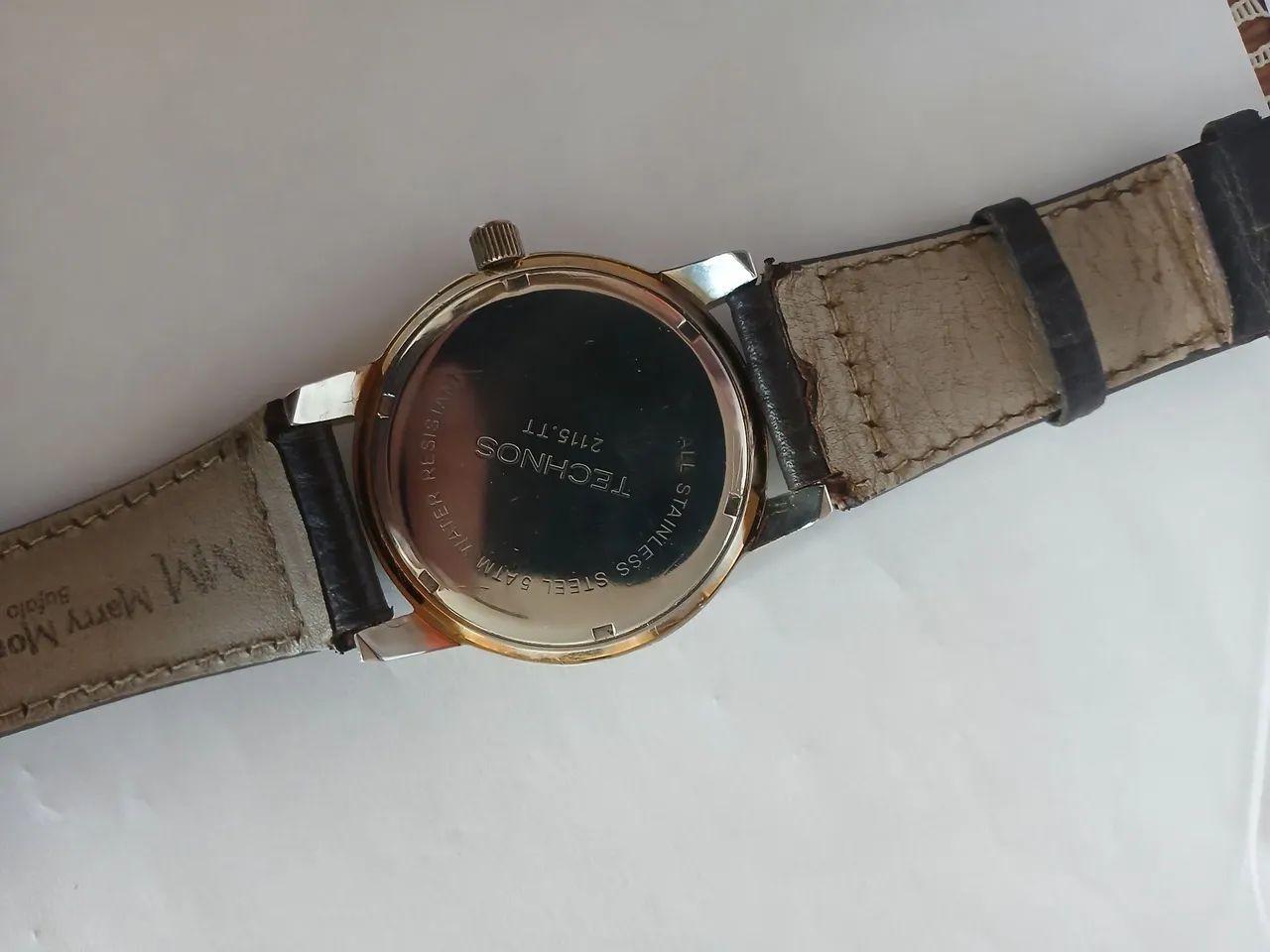 Technos golf prata e dourado com pulseira de couro.  - Foto 4