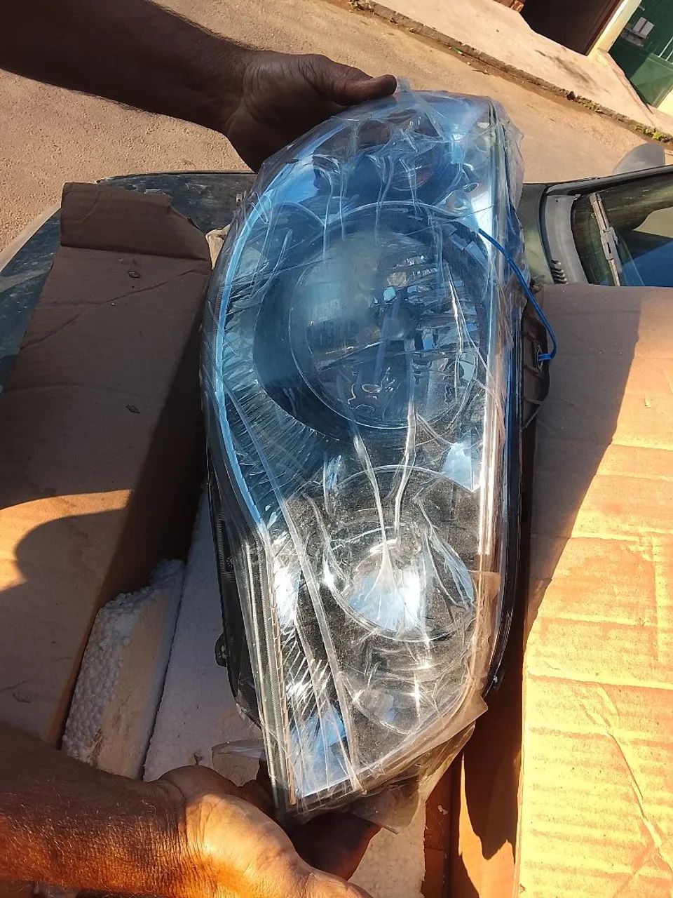 Par de farol de carro