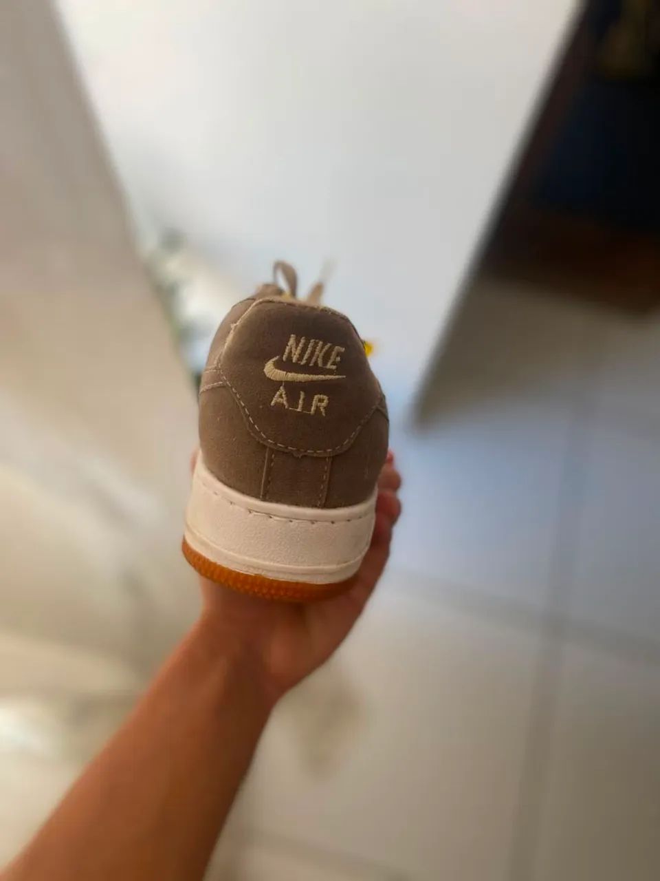 Tênis Nike. 