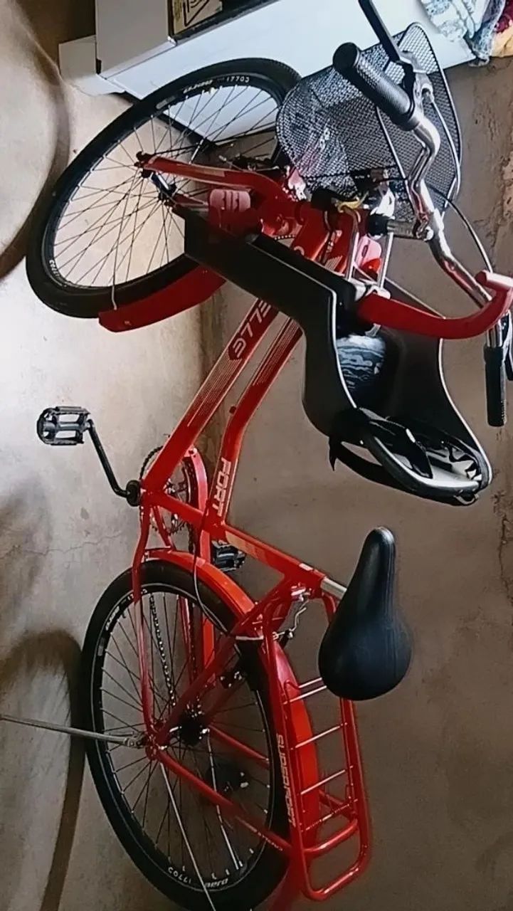 Vende se uma bicicleta seminovo com cadeirinha  - Foto 2