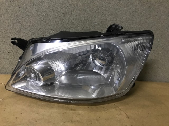 Farol Chevrolet Classic 