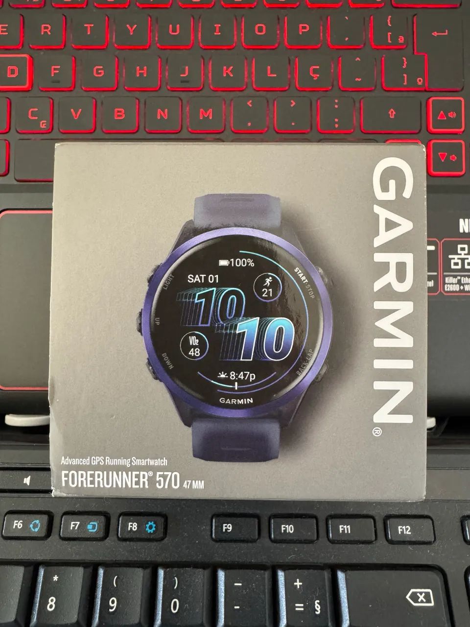 Garmin Forerunner 570 Roxo 47mm - Use o cupom ELETRO5