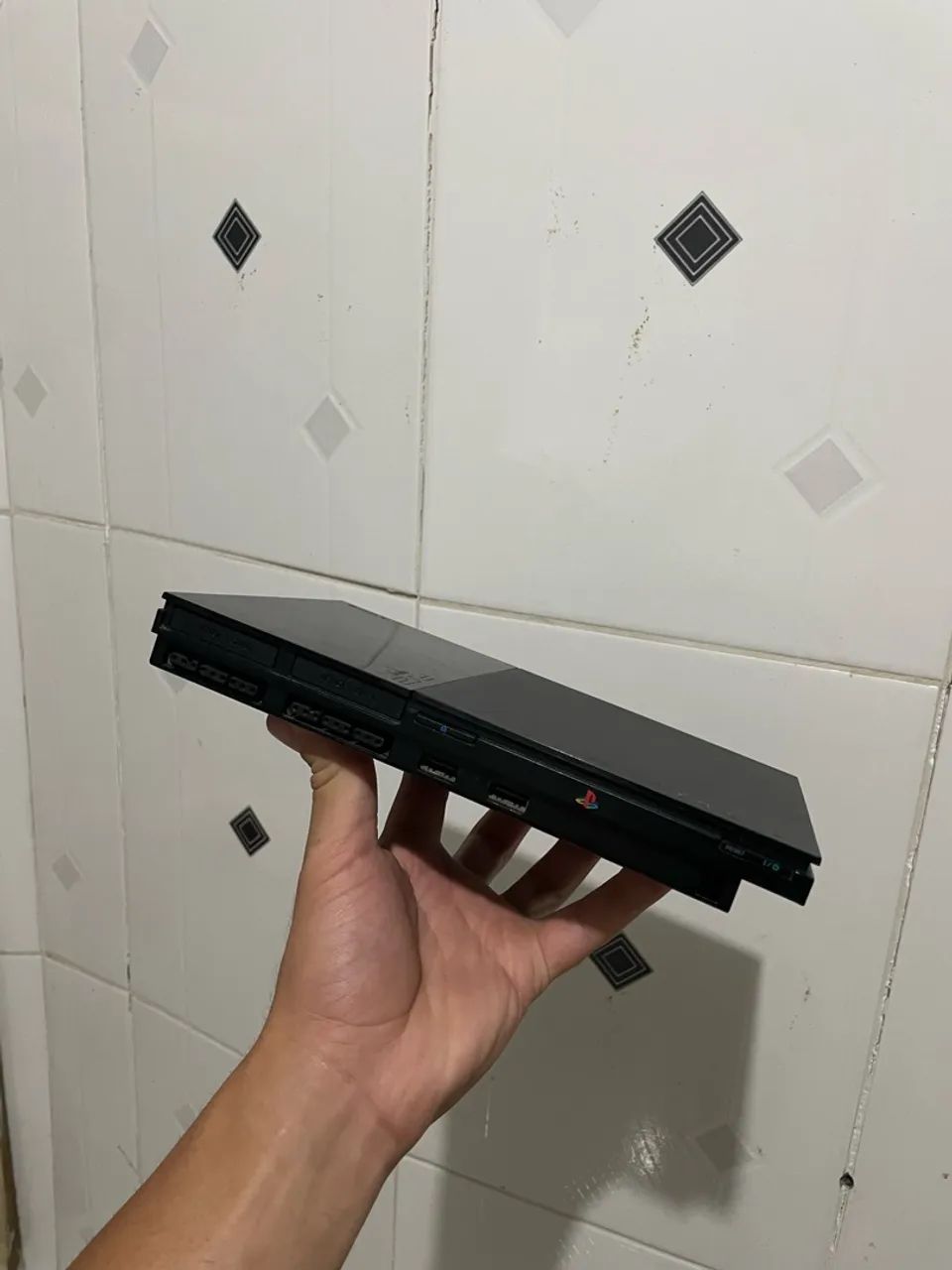 Vendo Ps2 slim, bem conservado. 