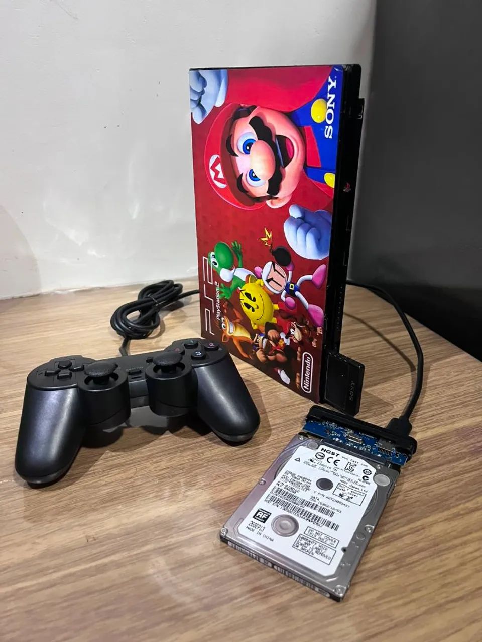 vendo ps2 slim desbloq.