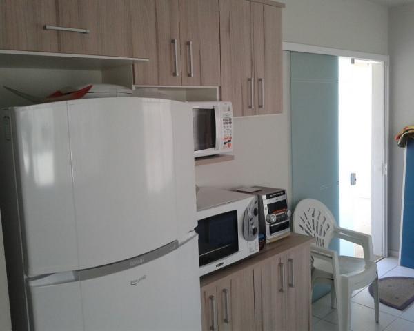 Linda casa em barra velha averbada 350mts do mar 03 dormitórios aceito carro no negócio - Foto 4