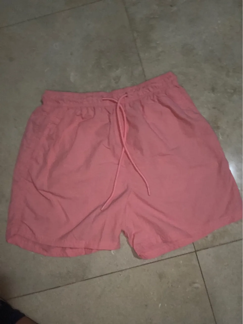 Shorts rosa de praia