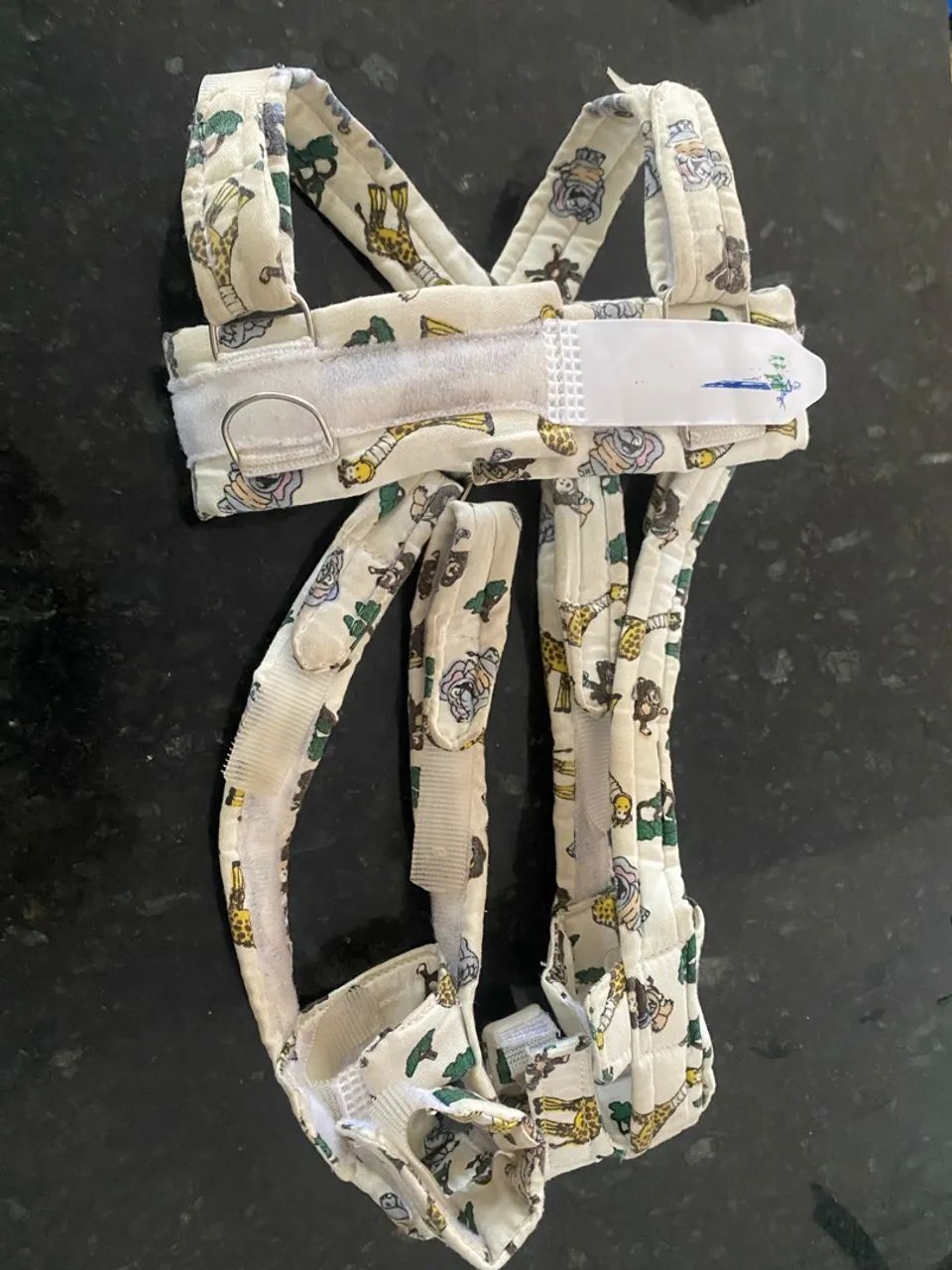 suspensório de pavlik usado apenas um mês
