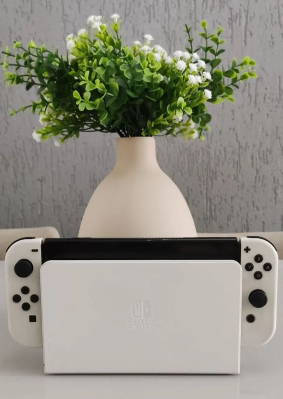 Nintendo Switch OLED 64GB + SanDisk 128GB - Foto 2