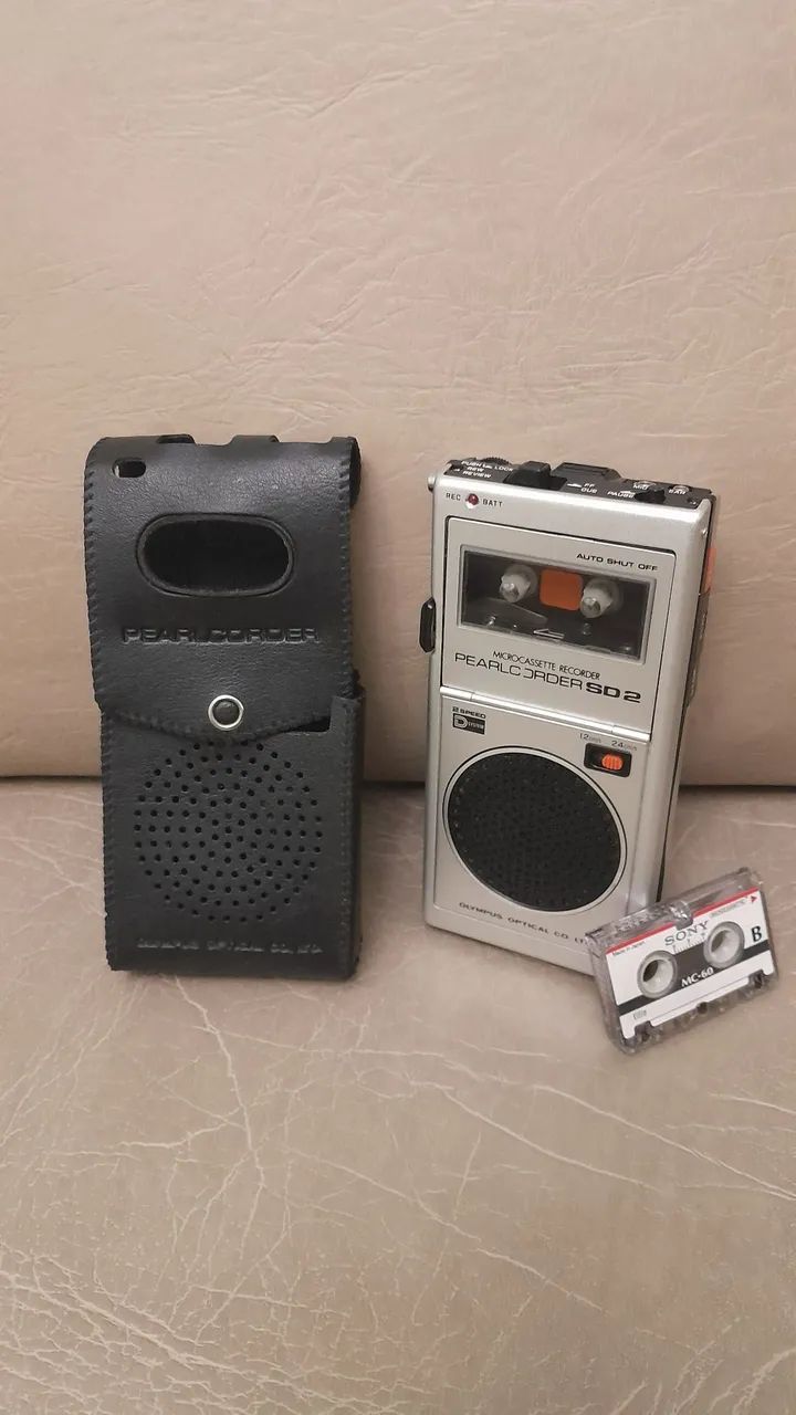 Antigo microcassette japonês funcionando perfeito. 