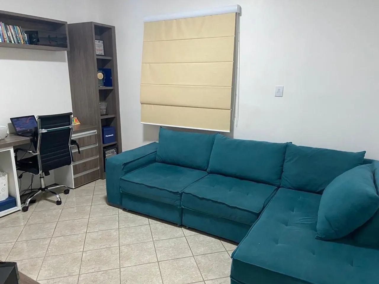 Sofa retrátil  em L