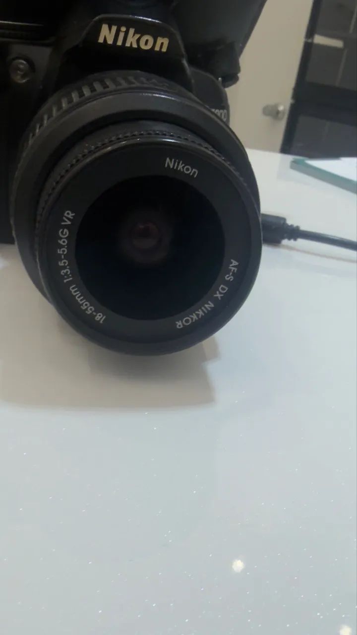 Nikon D3000 - Foto 4