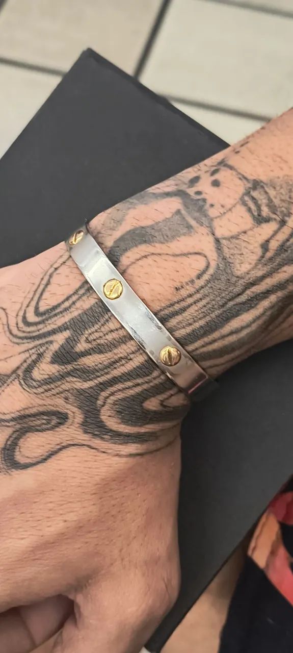 Bracelete em aço com detalhes em ouro 18k - Foto 4