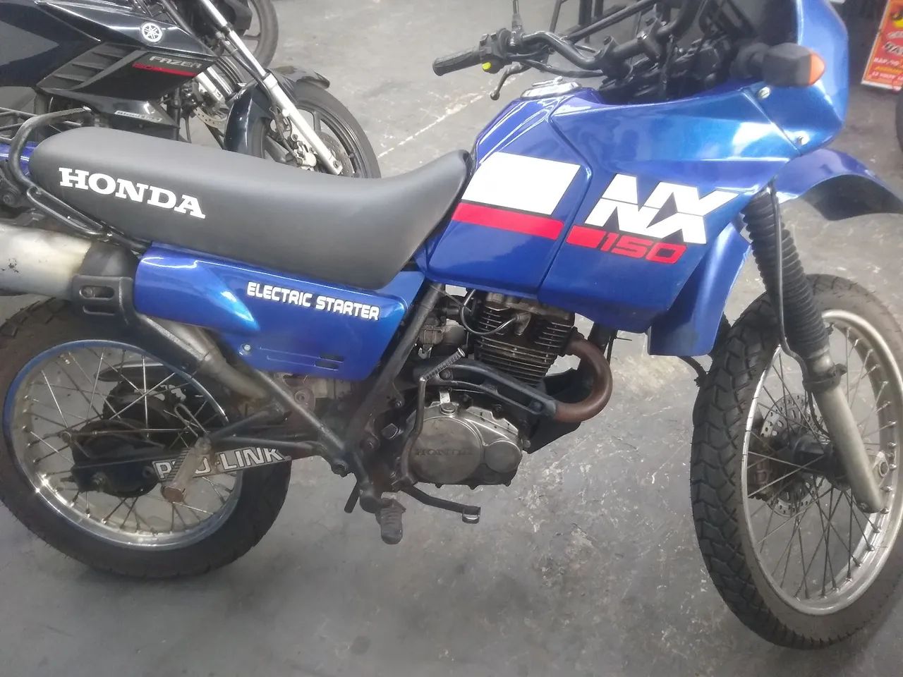 NX 150 1989  ENT. $ 900, + 18 X $ 498,00 CARTÃO DE CRÉDITO)