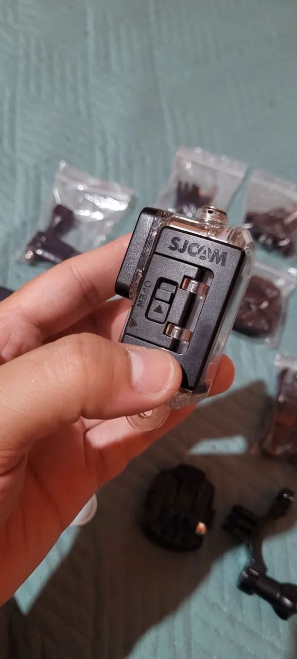 Câmera SJCAM Filma em 2k 60fps, acompanha cartão de memória, bateria extra e acessórios  - Foto 4