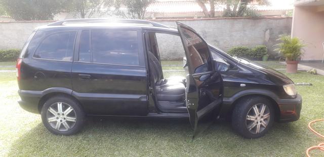 Troco por moto zafira elite 2.0 8v Automatica , banco de couro