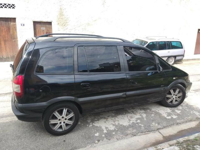 Troco por moto zafira elite 2.0 8v Automatica , banco de couro - Foto 5