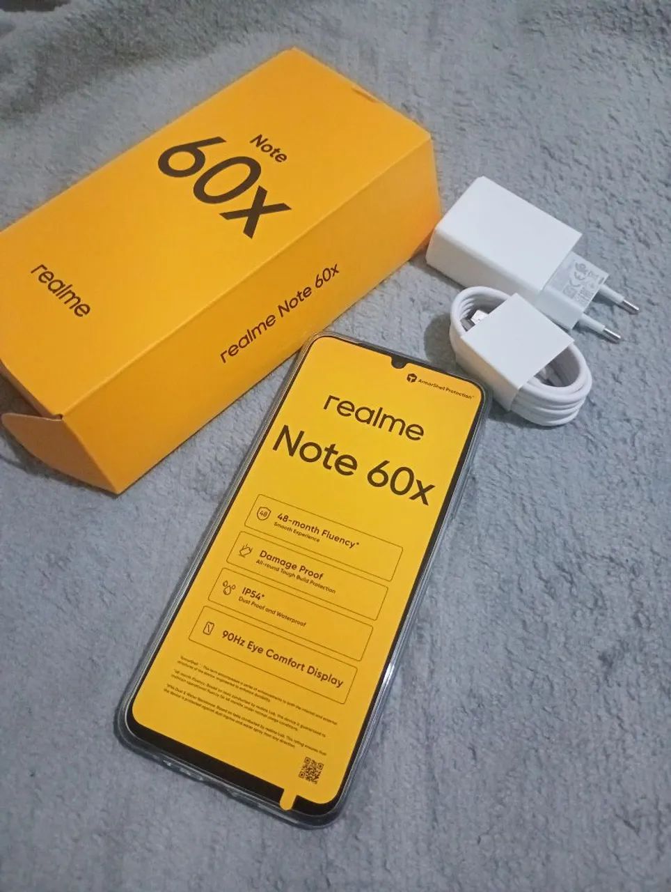 celular novo na caixa 