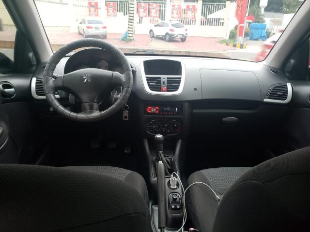 Peugeot 207 passion 1.4 ano 2013 completo 3000 de entrada - Foto 8