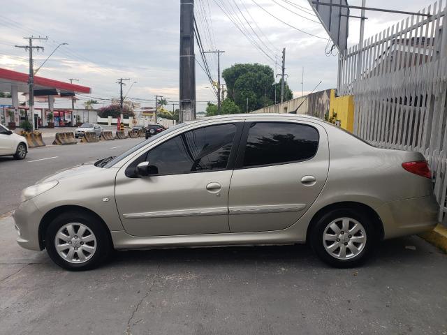 Peugeot 207 passion 1.4 ano 2013 completo 3000 de entrada - Foto 2
