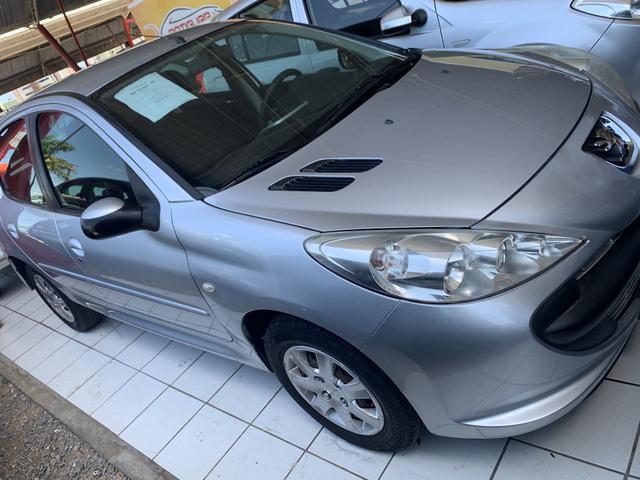 Peugeot 1.4 2011 completo de 19.990 por 16.990 a vis