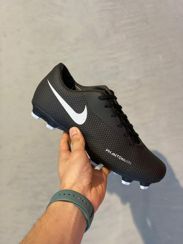 chuteira nike ou adidas