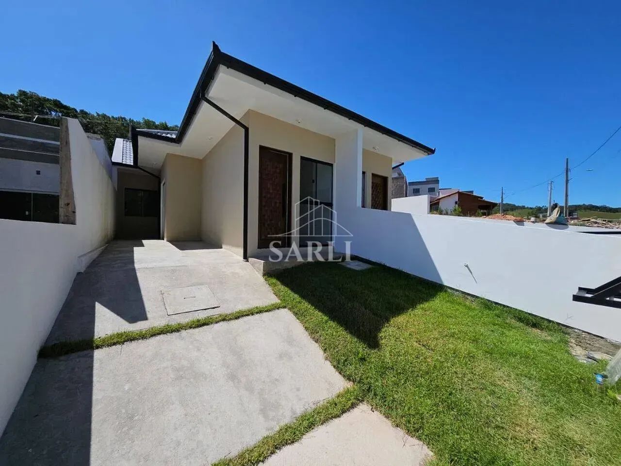 Casa, com 3 dormitórios, sendo 2 suítes, de 198 m² Bairro Deltaville - Biguaçu