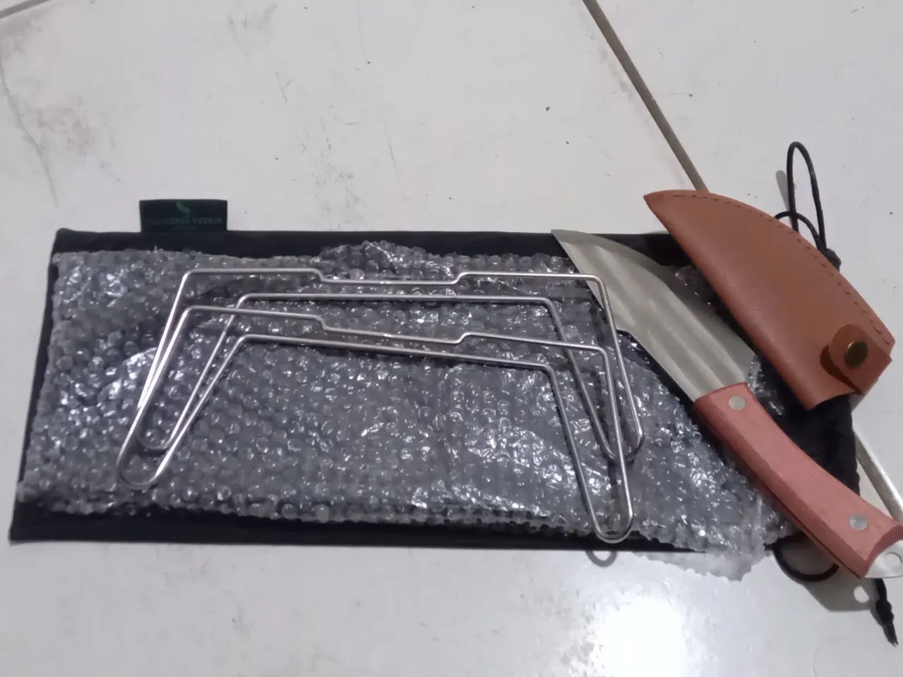 Faça e pesa de apoio de acampamento 