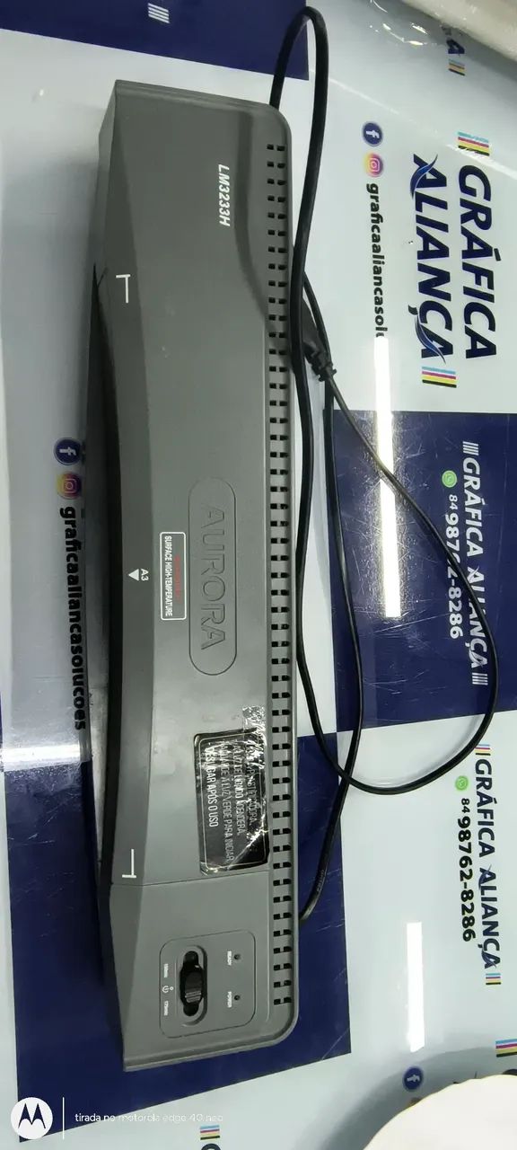 Laminadora e plastificadora.
