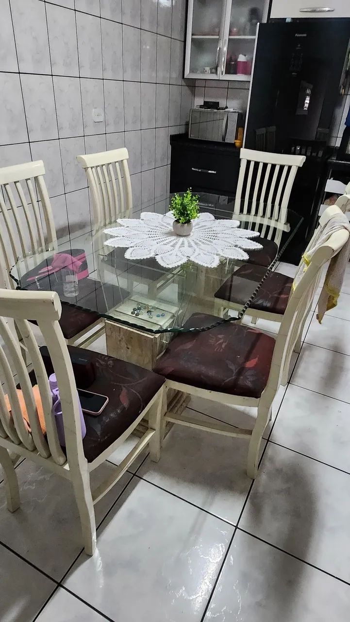 Mesa 6 lugares de vidro com bases de mármore 