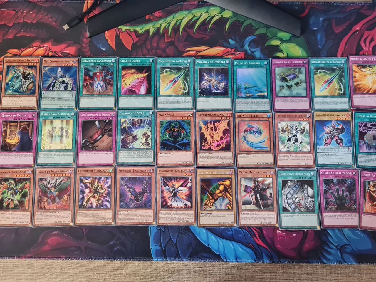 210 Cartas Yugioh diversas e 54 sleeves para proteger as cartas - Foto 4
