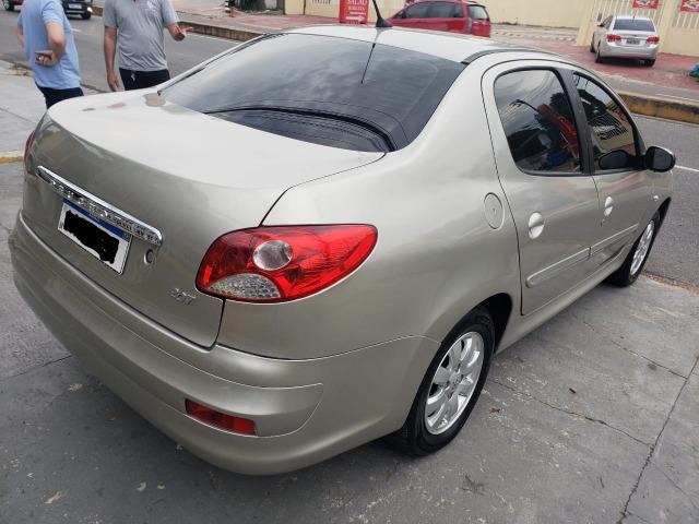 Peugeot 207 passion 1.4 ano 2013 completo 3000 de entrada - Foto 3