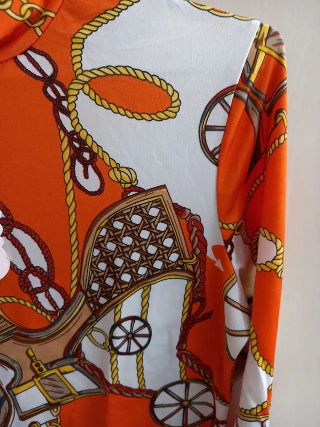 Blusa de manga comprida e com estampas - Foto 4