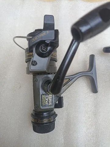Molinetes Shimano Bass One e Black Magnum, - Foto 4