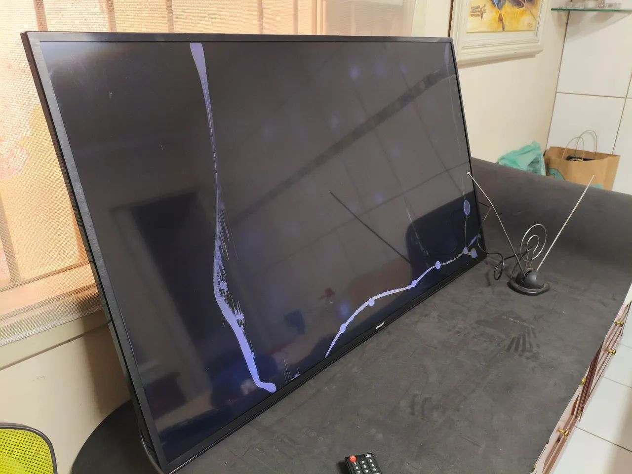 Tv Samsung 49 com trico na tela