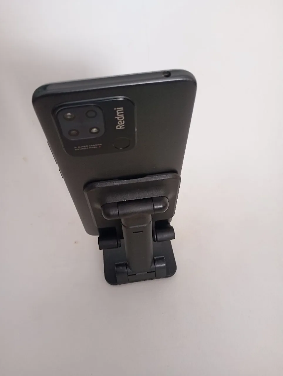 Redmi 10c 128 gigas semi novo tem caixa carregador e película