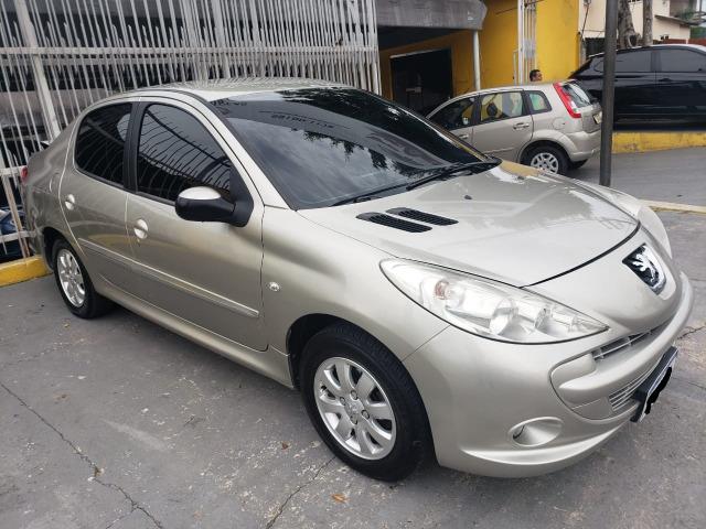 Peugeot 207 passion 1.4 ano 2013 completo 3000 de entrada - Foto 7