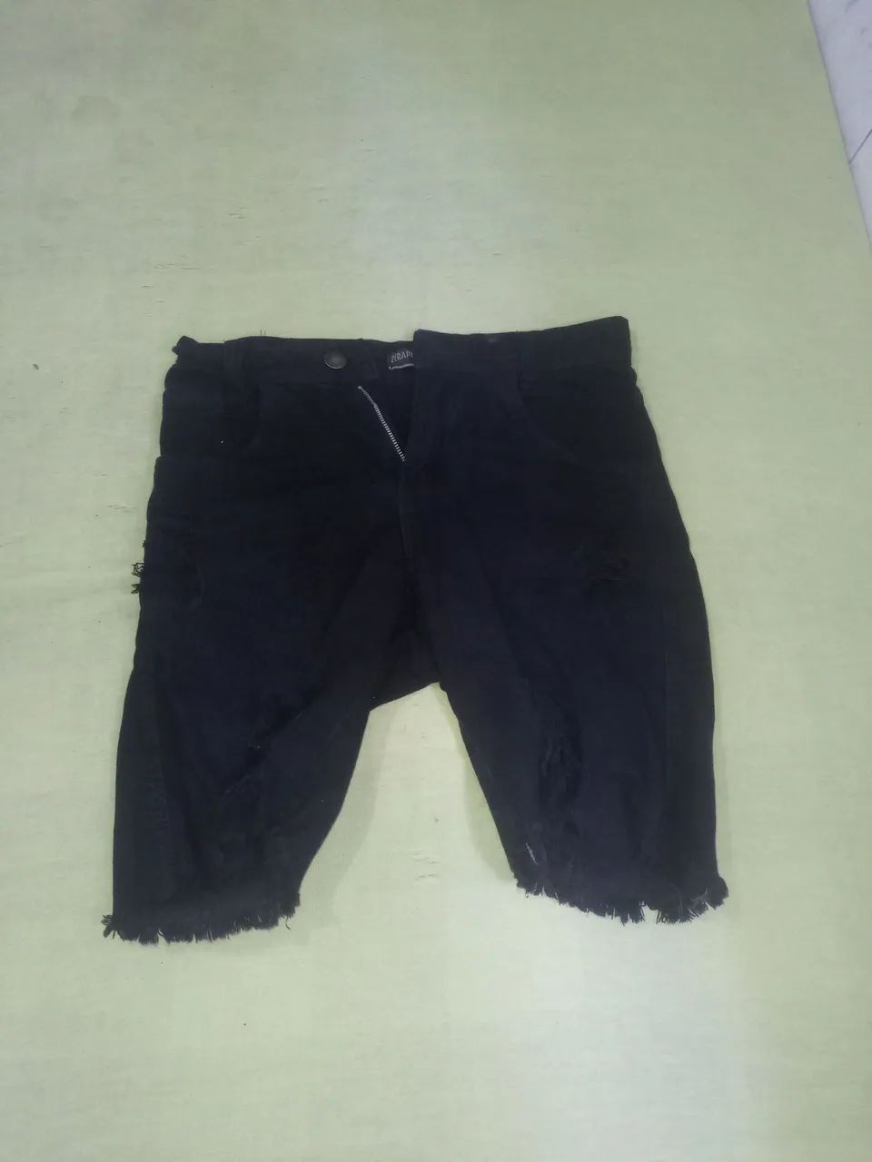 Bermuda jeans rasgada 