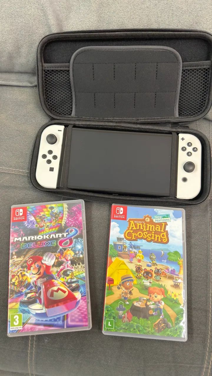 Nintendo Switch OLED + 2 Jogos - Foto 5