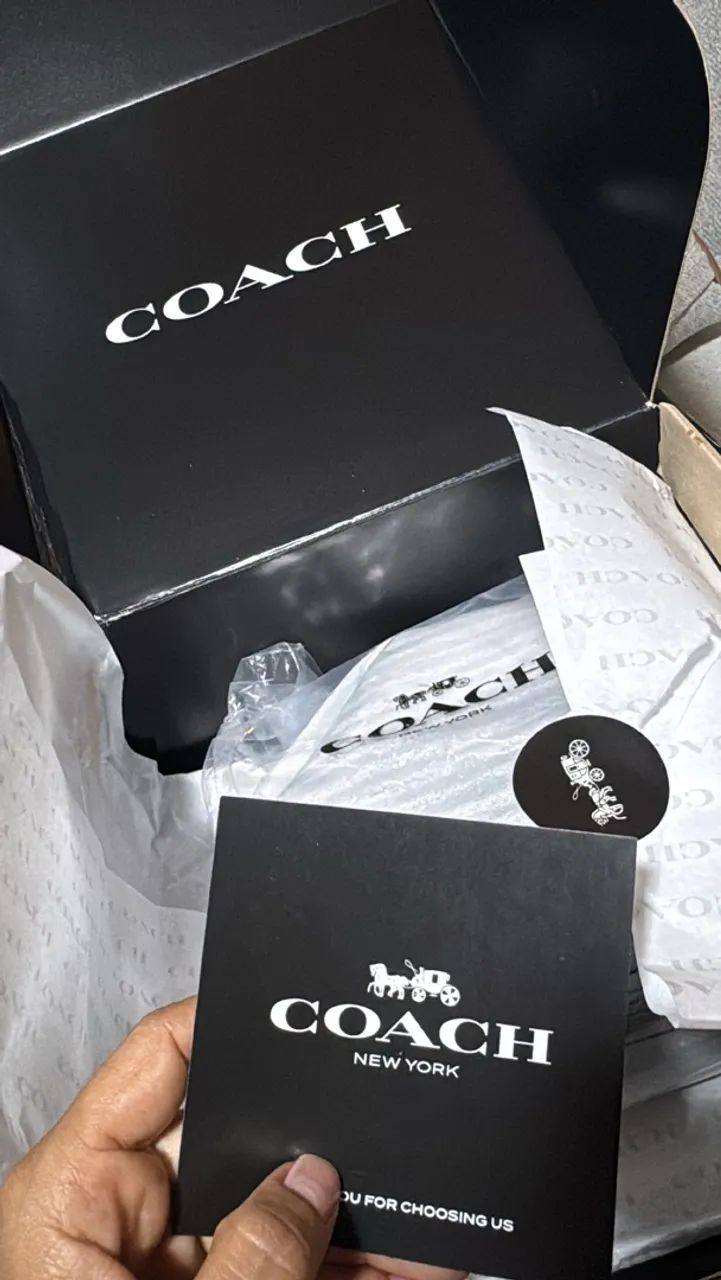 Caixa de bolsa coach
