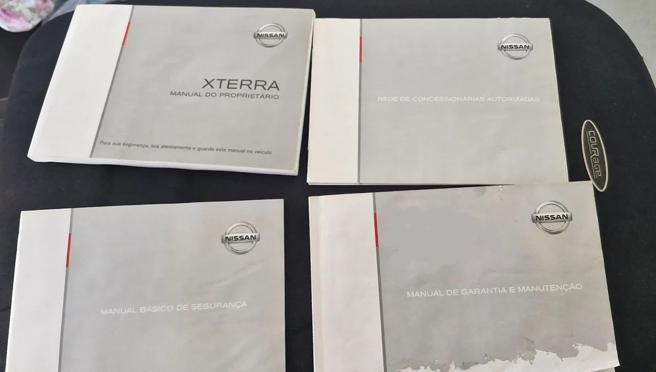 Manuais Nissan Xterra e VW POLO 2006