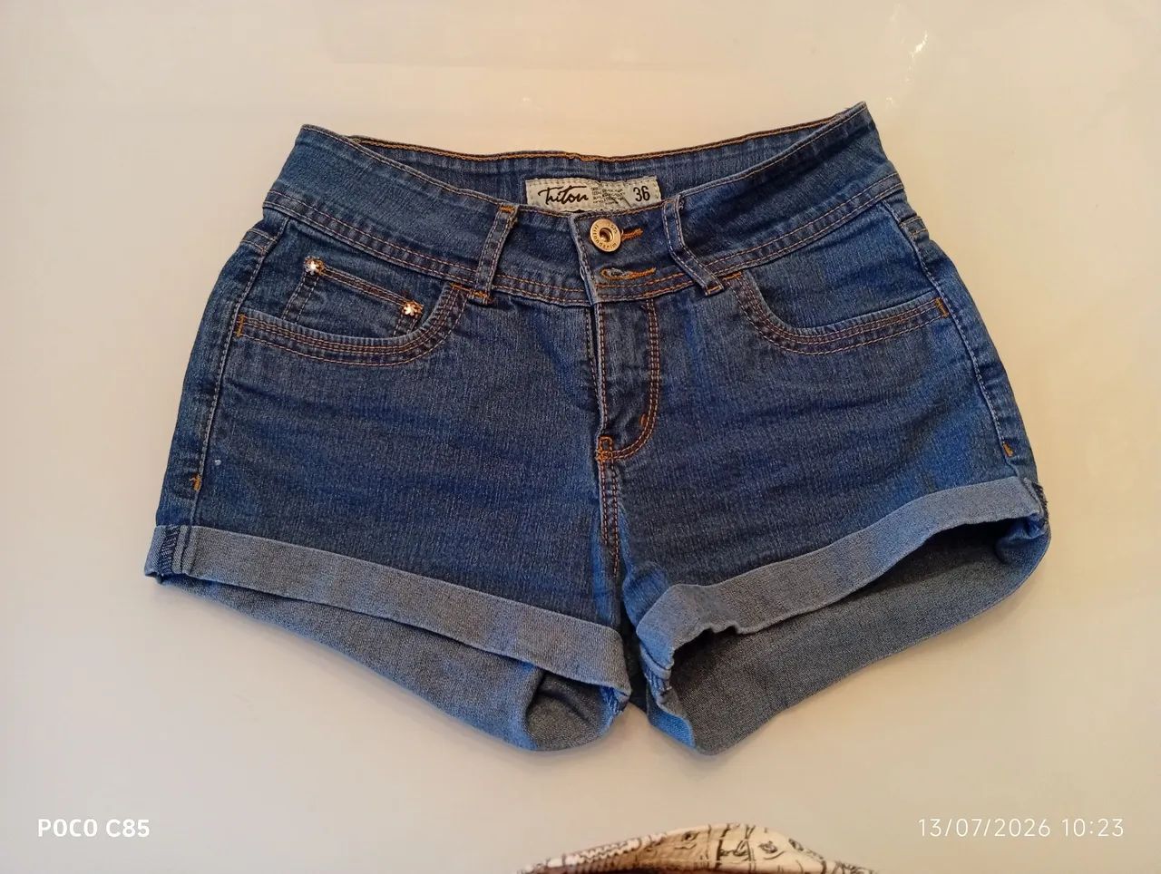 Short Triton feminino.