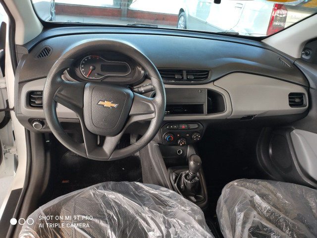 Chevrolet Onix Joy Completo (igual 0 km) - Foto 3