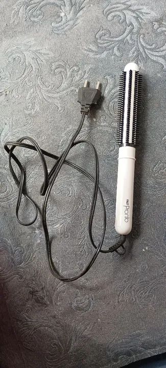 Escova modeladora de cabelos 