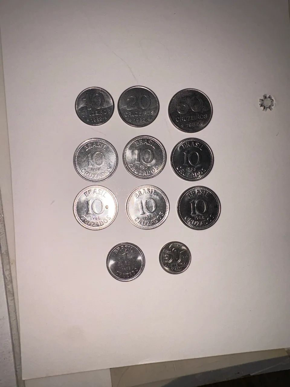 Moedas de cruzeiros e cruzados